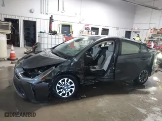 2021 Toyota Prius L Eco with VIN JTDKAMFU9M3132587, listed as a IAAI auction lot 41637275 with 84,203 mi miles. Bid and sale history available at carsss.com. Image 14.
