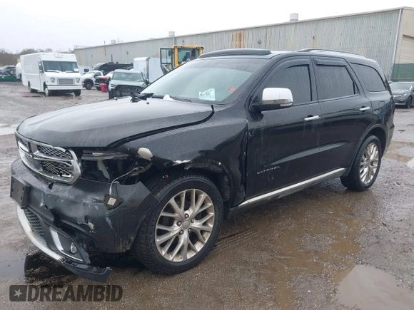 2014 Dodge Durango Citadel with VIN 1C4RDJEG5EC466164, listed as a IAAI auction lot 40936279 with 259,102 mi miles and . Bid and sale history available at DreamBid. Image 2.
