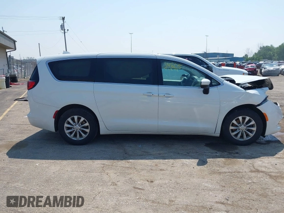 2017 Chrysler Pacifica Touring with VIN 2C4RC1DG4HR533711, listed as a IAAI auction lot 42434805 with 141,859 mi miles and . Bid and sale history available at DreamBid. Image 13.