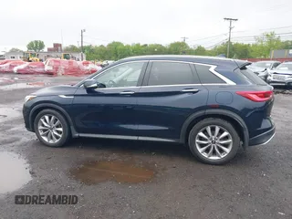 2020 Infiniti QX50 Luxe with VIN 3PCAJ5M3XLF107050, listed as a IAAI auction lot 42176146 with 54,347 mi miles and . Bid and sale history available at DreamBid. Image 14.