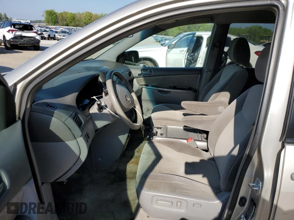 2009 Toyota Sienna CE with VIN 5TDZK23C89S250759, listed as a Copart auction lot 52360615 with 231,655 mi miles and Salvage Title. Bid and sale history available at DreamBid. Image 7.