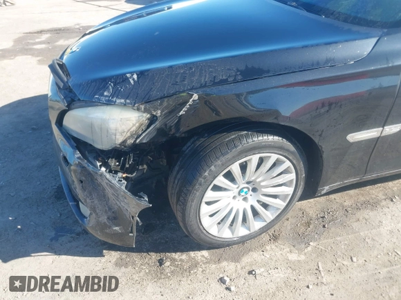 2011 BMW 7 Series 750Li xDrive with VIN WBAKC8C53BC433865, listed as a IAAI auction lot 41823357 with 122,476 mi miles. Bid and sale history available at carsss.com. Image 6.