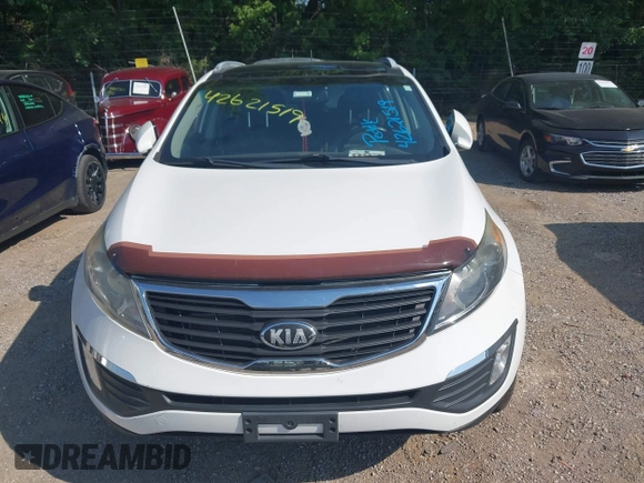 2013 Kia Sportage EX with VIN KNDPCCA22D7363985, listed as a IAAI auction lot 42621519 with 160,029 mi miles and . Bid and sale history available at DreamBid. Image 6.