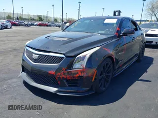 2016 Cadillac ATS-V with VIN 1G6AN5SY1G0106427, listed as a IAAI auction lot 42020517 with 59,279 mi miles. Bid and sale history available at carsss.com. Image 2.