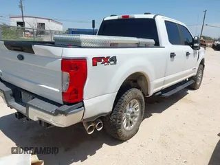 2020 Ford F-250 XL with VIN 1FT7W2BT2LED60958, listed as a IAAI auction lot 42661421 with 107,199 mi miles and . Bid and sale history available at DreamBid. Image 4.