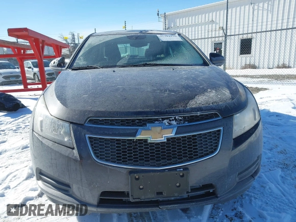 2014 Chevrolet Cruze 1LT z VIN 1G1PC5SB0E7419345, wystawiony jako IAAI lot #41412379 z przebiegiem 114 282 mil mil oraz . Historia ofert i sprzedaży dostępna na DreamBid. Obrazek 12.