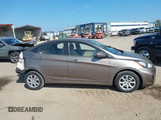 2012 Hyundai Accent GLS with VIN KMHCT4AE4CU097413, listed as a IAAI auction lot 42024571 with 120,672 mi miles. Bid and sale history available at carsss.com. Image 12.
