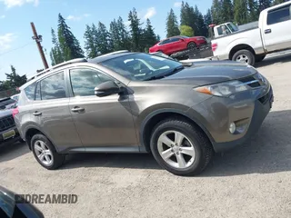 2013 Toyota RAV4 XLE with VIN JTMRFREV9DD024522, listed as a IAAI auction lot 42169755 with 164,493 mi miles and . Bid and sale history available at carsss.com. Image 13.