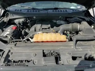 2017 Ford F-150 XLT with VIN 1FTEW1EP1HFB74846, listed as a Copart auction lot 87084475 with 128,753 mi miles and Salvage title. Bid and sale history available at DreamBid. Image 13.