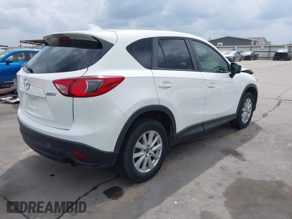 2013 Mazda CX-5 Touring with VIN JM3KE2CE5D0117714, listed as a IAAI auction lot 41889900 with 200,949 mi miles. Bid and sale history available at carsss.com. Image 4.