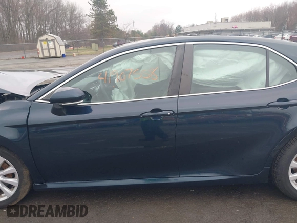 2020 Toyota Camry LE with VIN 4T1L11AK3LU977805, listed as a IAAI auction lot 41907558 with 82,237 mi miles and . Bid and sale history available at DreamBid. Image 15.