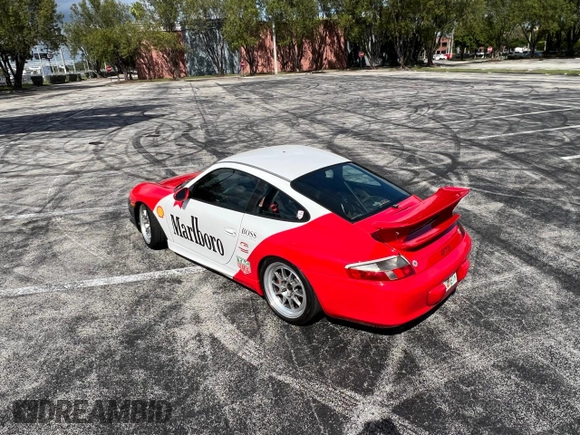 2004 Porsche 911 z VIN WP0AC299X4S692464, wystawiony jako Copart lot #50950705 z przebiegiem 44 494 mil mil oraz Czysty tytuł • Clean title. Historia ofert i sprzedaży dostępna na DreamBid. Obrazek 2.