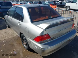 2002 Mitsubishi Lancer ES with VIN JA3AJ26E82U076009, listed as a IAAI auction lot 41671572 with 172,236 mi miles. Bid and sale history available at carsss.com. Image 3.
