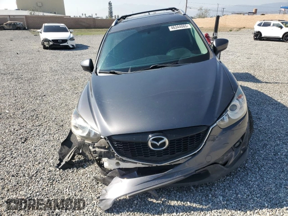 2014 Mazda CX-5 Touring with VIN JM3KE4CY6E0375084, listed as a Copart auction lot 46344065 with 143,828 mi miles and Salvage Title. Bid and sale history available at carsss.com. Image 5.