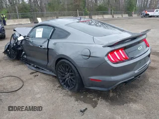 2021 Ford Mustang GT z VIN 1FA6P8CF4M5148249, wystawiony jako IAAI lot #41949502 z przebiegiem 20 993 mil mil oraz . Historia ofert i sprzedaży dostępna na DreamBid. Obrazek 3.
