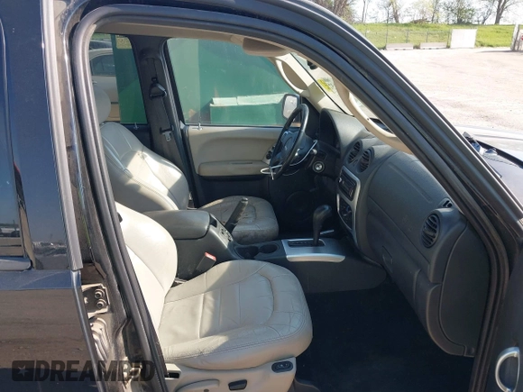 2003 Jeep Liberty Limited with VIN 1J4GL58K43W621052, listed as a IAAI auction lot 42221352 with 156,836 mi miles and . Bid and sale history available at DreamBid. Image 5.