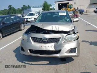 2010 Toyota Corolla with VIN 1NXBU4EE1AZ187568, listed as a IAAI auction lot 42634794 with 86,189 mi miles and . Bid and sale history available at DreamBid. Image 6.