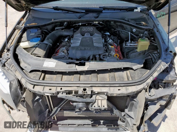 2014 Audi Q7 S line Prestige z VIN WA1DGAFE5ED002505, wystawiony jako Copart lot #56733525 z przebiegiem 102 409 mil mil oraz Szkoda całkowita • Salvage title. Historia ofert i sprzedaży dostępna na DreamBid. Obrazek 12.