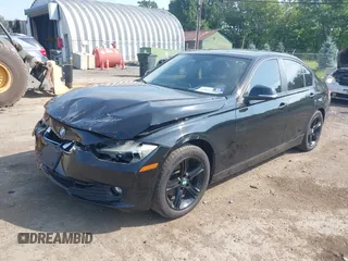 2013 BMW 3 Series 320i xDrive with VIN WBA3C3C50DF981864, listed as a IAAI auction lot 42599429 with 155,150 mi miles and . Bid and sale history available at DreamBid. Image 2.