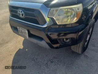 2014 Toyota Tacoma with VIN 3TMMU4FN4EM068712, listed as a IAAI auction lot 41967751 with 241,328 mi miles and . Bid and sale history available at DreamBid. Image 1.