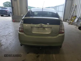 2007 Toyota Prius z VIN JTDKB20U577556730, wystawiony jako Copart lot #61117255 z przebiegiem Nie podano mil oraz Nie do naprawy • Non repairable. Historia ofert i sprzedaży dostępna na DreamBid. Obrazek 6.