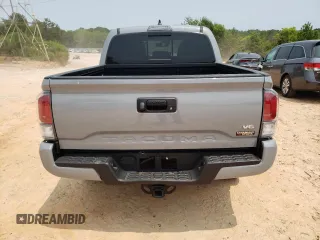 2021 Toyota Tacoma SR5 z VIN 5TFAZ5CN2MX099562, wystawiony jako Copart lot #59329335 z przebiegiem 23 570 mil mil oraz Czysty tytuł • Clean title. Historia ofert i sprzedaży dostępna na DreamBid. Obrazek 6.