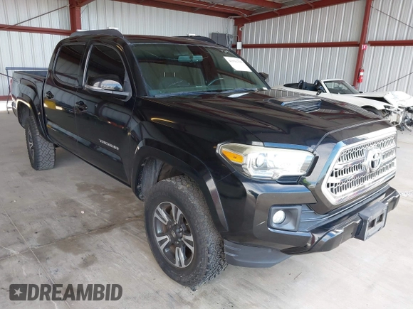 2016 Toyota Tacoma SR with VIN 5TFCZ5AN8GX020900, listed as a IAAI auction lot 41911329 with 133,931 mi miles. Bid and sale history available at carsss.com. Image 1.