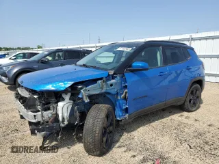 2021 Jeep Compass Altitude with VIN 3C4NJDBB0MT558948, listed as a Copart auction lot 57182965 with 73,644 mi miles and Salvage title. Bid and sale history available at DreamBid. Image 1.