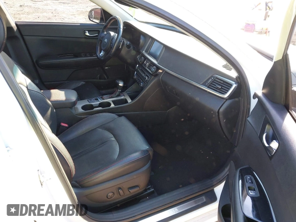 2016 Kia Optima SX Turbo with VIN 5XXGW4L2XGG084628, listed as a IAAI auction lot 41668592 with 116,535 mi miles and . Bid and sale history available at carsss.com. Image 5.