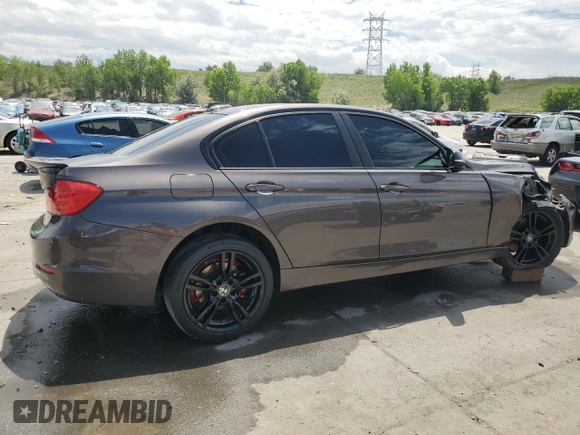 2014 BMW 3 Series 320i xDrive with VIN WBA3C3C53EK200375, listed as a Copart auction lot 59915595 with 104,320 mi miles and Salvage title. Bid and sale history available at DreamBid. Image 3.