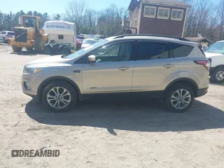 2017 Ford Escape SE with VIN 1FMCU9GD1HUD23228, listed as a IAAI auction lot 42074213 with 115,757 mi miles. Bid and sale history available at carsss.com. Image 14.