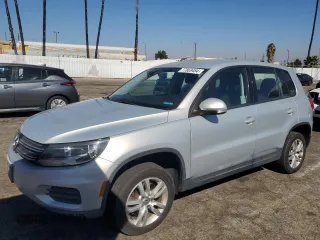2013 Volkswagen Tiguan SE with VIN WVGAV3AX7DW607224, listed as a Copart auction lot 77869484 with 202,963 mi miles and Salvage title. Bid and sale history available at DreamBid. Image 1.