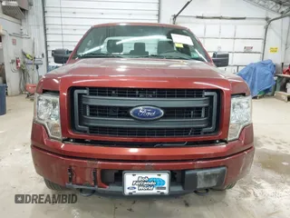 2014 Ford F-150 XL with VIN 1FTMF1EM4EKD79307, listed as a IAAI auction lot 42137527 with 57,963 mi miles. Bid and sale history available at carsss.com. Image 12.