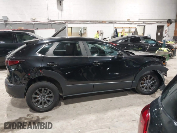 2021 Mazda CX-30 S with VIN 3MVDMBAL0MM226504, listed as a IAAI auction lot 41619102 with 87,998 mi miles and . Bid and sale history available at carsss.com. Image 13.
