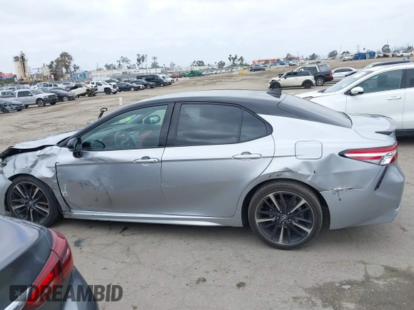 2020 Toyota Camry XSE with VIN 4T1K61AK1LU318098, listed as a IAAI auction lot 42197271 with 64,118 mi miles and . Bid and sale history available at DreamBid. Image 14.