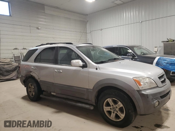 2005 Kia Sorento LX with VIN KNDJC733055350507, listed as a Copart auction lot 42380385 with 226,279 mi miles and Salvage title. Bid and sale history available at DreamBid. Image 4.