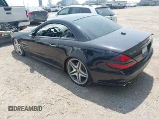 2005 Mercedes-Benz SL 55 AMG with VIN WDBSK74F85F101039, listed as a IAAI auction lot 42812397 with 76,452 mi miles and . Bid and sale history available at DreamBid. Image 3.