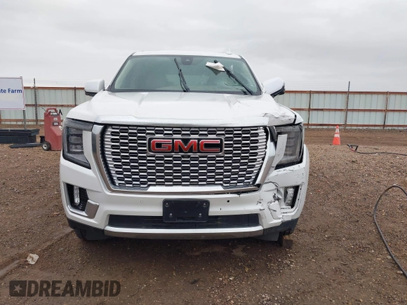 2021 GMC Yukon Denali with VIN 1GKS2DKL0MR178210, listed as a IAAI auction lot 41934532 with 91,785 mi miles. Bid and sale history available at carsss.com. Image 12.