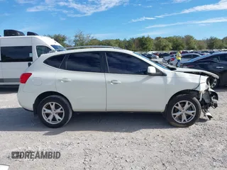 2009 Nissan Rogue SL with VIN JN8AS58T39W058077, listed as a IAAI auction lot 41311692 with 131,765 mi miles and . Bid and sale history available at DreamBid. Image 13.