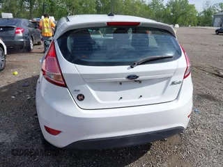 2018 Ford Fiesta SE z VIN 3FADP4EJXJM100407, wystawiony jako IAAI lot #42285374 z przebiegiem 90 261 mil mil oraz . Historia ofert i sprzedaży dostępna na DreamBid. Obrazek 16.