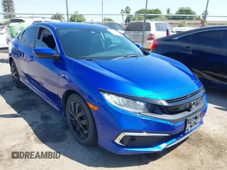 2020 Honda Civic LX with VIN 2HGFC2F61LH569059, listed as a IAAI auction lot 42448418 with 83,986 mi miles and . Bid and sale history available at DreamBid. Image 1.