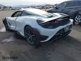 2021 McLaren 765LT with VIN SBM14RCA3MW765344, listed as a IAAI auction lot 40934179 with 10,900 mi miles. Bid and sale history available at carsss.com. Image 3.