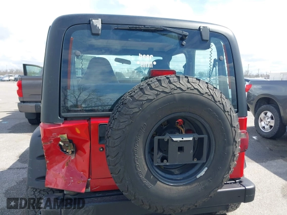 2002 Jeep Wrangler X with VIN 1J4FA39S02P739211, listed as a IAAI auction lot 41665910 with 144,118 mi miles. Bid and sale history available at carsss.com. Image 8.