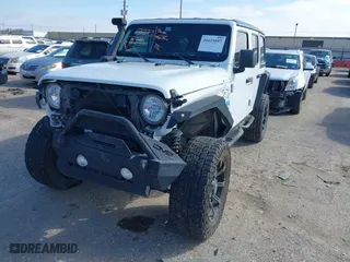 2018 Jeep Wrangler Unlimited Sport S with VIN 1C4HJXDG0JW205803, listed as a IAAI auction lot 41615097 with 1 mi miles. Bid and sale history available at carsss.com. Image 2.