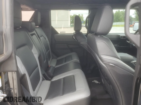 2024 Ford Bronco Big Bend z VIN 1FMDE7BH0RLA72175, wystawiony jako Copart lot #61061865 z przebiegiem 10 842 mil mil oraz Szkoda całkowita • Salvage title. Historia ofert i sprzedaży dostępna na DreamBid. Obrazek 11.