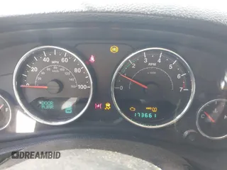 2012 Jeep Wrangler Unlimited Sport with VIN 1C4BJWDG2CL258264, listed as a IAAI auction lot 41880235 with 173,661 mi miles. Bid and sale history available at carsss.com. Image 7.