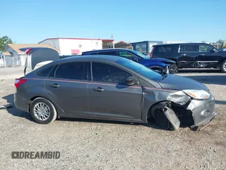 2013 Ford Focus S with VIN 1FADP3E24DL317766, listed as a IAAI auction lot 42029670 with 159,130 mi miles. Bid and sale history available at carsss.com. Image 13.