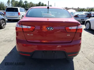 2014 Kia Rio LX with VIN KNADM4A32E6385200, listed as a Copart auction lot 52072335 with 94,790 mi miles and Salvage Title. Bid and sale history available at DreamBid. Image 6.