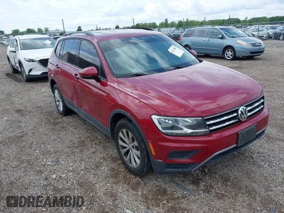 2018 Volkswagen Tiguan S with VIN 3VV1B7AX3JM045193, listed as a IAAI auction lot 42311886 with 69,049 mi miles and . Bid and sale history available at DreamBid. Image 1.