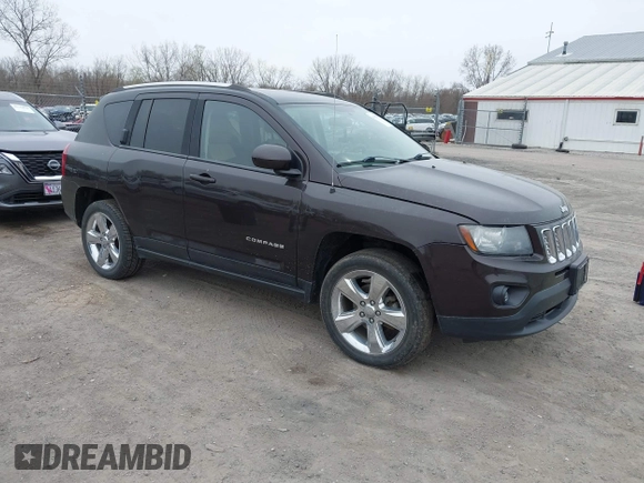 2014 Jeep Compass Latitude with VIN 1C4NJDEB5ED731057, listed as a IAAI auction lot 41938769 with 175,289 mi miles and . Bid and sale history available at carsss.com. Image 1.